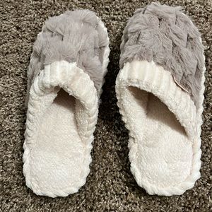 New in package. Fuzzy slippers. Size 36/37. I would say they are US size 7